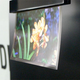 Illustration for article titled Flexible OLED Display is .05mm Thick, Flaps Around in the Wind